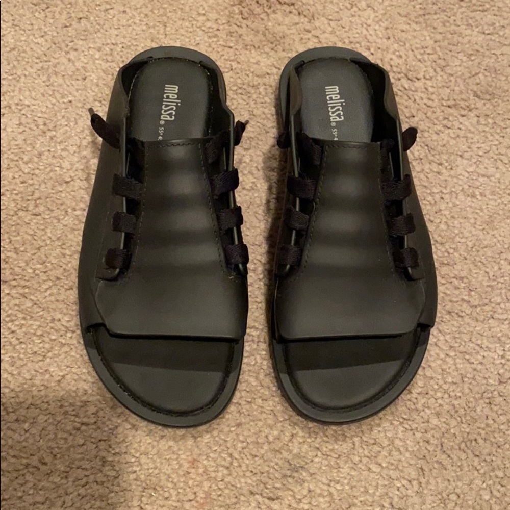 Melisa rubber slides.